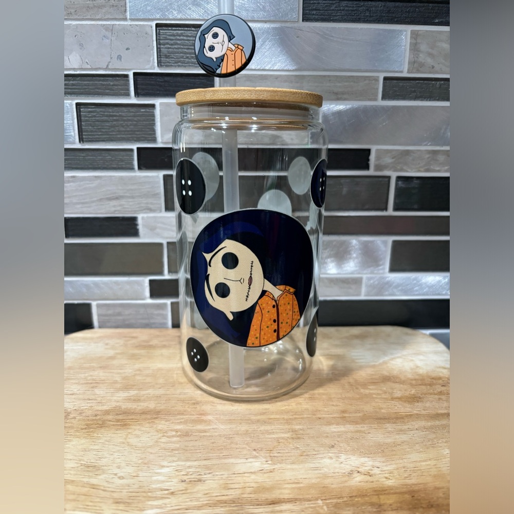Coraline glass cup with bamboo lid, straw and matching Coraline straw charm